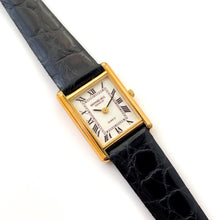 Load image into Gallery viewer, Vintage Tank-Style Gold-Plated Raymond Weil Quartz Watch with Black Leather Strap
