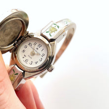 Load image into Gallery viewer, Vintage André Mouche Quartz Watch with Enamel Floral Design, Concealed Dial and Silver-Tone Bangle Bracelet
