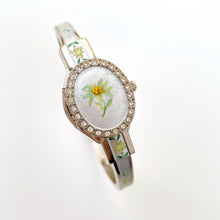 Load image into Gallery viewer, Vintage André Mouche Quartz Watch with Enamel Floral Design, Concealed Dial and Silver-Tone Bangle Bracelet
