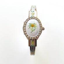 Load image into Gallery viewer, Vintage André Mouche Quartz Watch with Enamel Floral Design, Concealed Dial and Silver-Tone Bangle Bracelet
