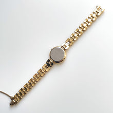 Load image into Gallery viewer, Rare 90s Gold-Plated Seiko Tissé Quartz Watch with Round Dial and Thin Bracelet
