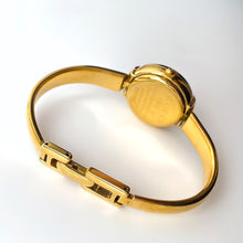 Load image into Gallery viewer, 90s Gold-Plated Gucci 1400L Bangle Quartz Watch with Horsebit Design
