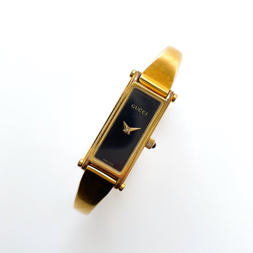 Vintage Ladies' Gold-Plated Gucci 1500L Bangle Quartz Watch with Black Rectangular Dial