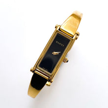 Load image into Gallery viewer, Vintage Ladies&#39; Gold-Plated Gucci 1500L Bangle Quartz Watch with Black Rectangular Dial
