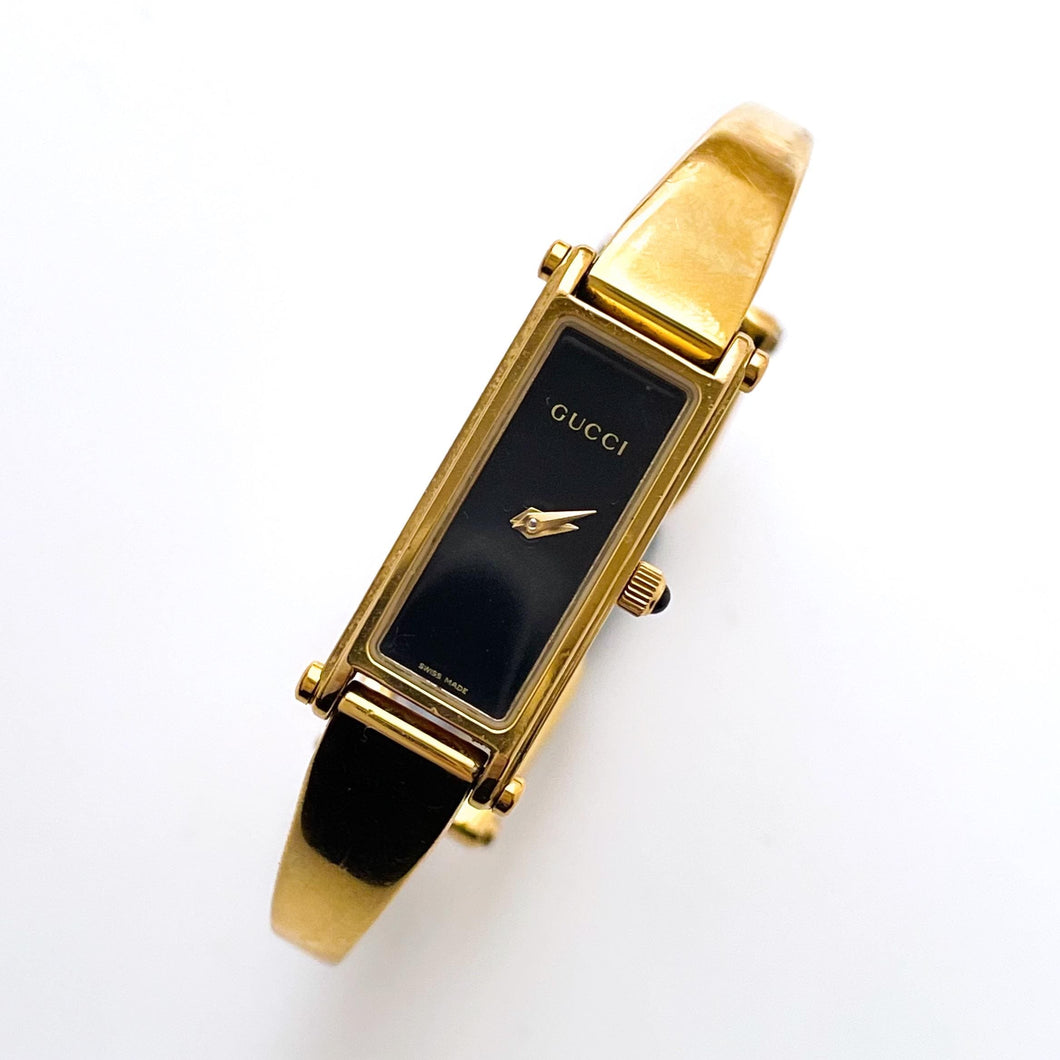 Vintage Ladies' Gold-Plated Gucci 1500L Bangle Quartz Watch with Black Rectangular Dial