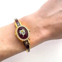 Load image into Gallery viewer, Vintage André Mouche Quartz Watch with Burgundy Enamel Floral Design, Concealead Dial and Gold-Plated Bangle Bracelet
