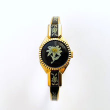 Load image into Gallery viewer, Vintage André Mouche Quartz Watch with Black and Green Enamel Floral Design, Concealed Dial and Gold-Plated Bangle Bracelet
