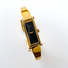 Load image into Gallery viewer, Vintage Ladies&#39; Gold-Plated Gucci 1500 Bangle Quartz Watch with Black Rectangular Dial
