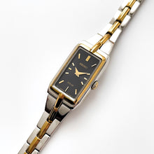 Load image into Gallery viewer, Vintage 1990s Two-Tone Ladies&#39; Seiko Solar Watch with Black Rectangular Dial
