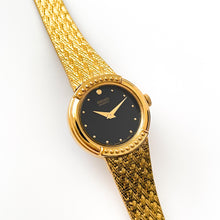 Load image into Gallery viewer, Vintage 1990s Ladies&#39; Gold-Plated Seiko Quartz Watch with Black Dial and Integrated Bracelet
