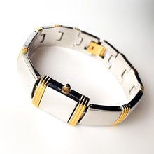 Load image into Gallery viewer, Vintage Anne Klein Peek-a-Boo Quartz Watch with Two-Tone Articulated Bangle Bracelet and Rectangular Dial
