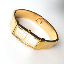 Load image into Gallery viewer, Vintage 90s Yves Saint Laurent Ladies&#39; Quartz Watch with Gold-Plated Bangle Bracelet and Cream Dial
