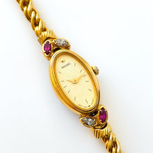 Load image into Gallery viewer, Very Rare 90s Gold-Plated Seiko Jewellery Quartz Watch with Tiny Dial, Thin Bracelet 2 Rubies and 2 Diamonds
