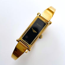 Load image into Gallery viewer, Vintage Ladies&#39; Gold-Plated Gucci 1500 Bangle Quartz Watch with Black Rectangular Dial
