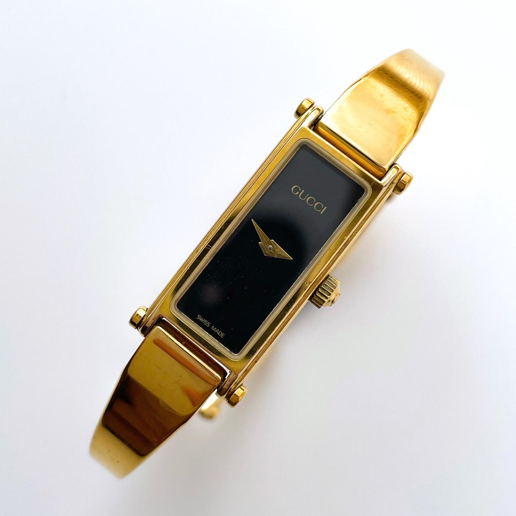 Vintage Ladies' Gold-Plated Gucci 1500 Bangle Quartz Watch with Black Rectangular Dial