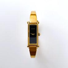 Load image into Gallery viewer, Vintage Ladies&#39; Gold-Plated Gucci 1500 Bangle Quartz Watch with Black Rectangular Dial
