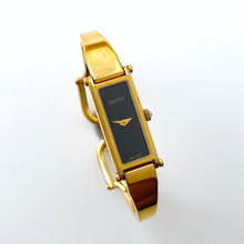 Load image into Gallery viewer, Vintage Ladies&#39; Gold-Plated Gucci 1500 Bangle Quartz Watch with Black Rectangular Dial
