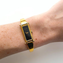 Load image into Gallery viewer, Vintage Ladies&#39; Gold-Plated Gucci 1500 Bangle Quartz Watch with Black Rectangular Dial
