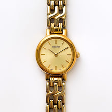 Load image into Gallery viewer, Vintage 1990s Gold-Plated Ladies&#39; Seiko Quartz Watch with Round Dial and Intricate Bracelet
