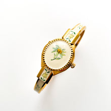 Load image into Gallery viewer, Vintage André Mouche Quartz Watch with Enamel Floral Design, Concealed Dial and Gold-Plated Bangle Bracelet
