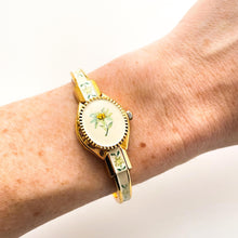 Load image into Gallery viewer, Vintage André Mouche Quartz Watch with Enamel Floral Design, Concealed Dial and Gold-Plated Bangle Bracelet
