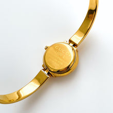 Load image into Gallery viewer, 90s Gold-Plated Gucci 1400L Bangle Quartz Watch with Horsebit Design and White Dial
