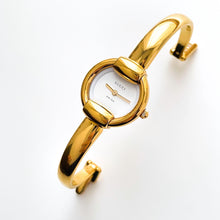 Load image into Gallery viewer, 90s Gold-Plated Gucci 1400L Bangle Quartz Watch with Horsebit Design and White Dial
