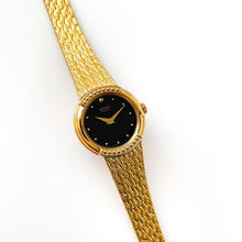 Load image into Gallery viewer, Vintage 1990s Ladies&#39; Gold-Plated Seiko Quartz Watch with Black Dial and Integrated Bracelet
