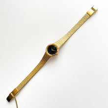 Load image into Gallery viewer, Vintage 1990s Ladies&#39; Gold-Plated Seiko Quartz Watch with Black Dial and Integrated Bracelet
