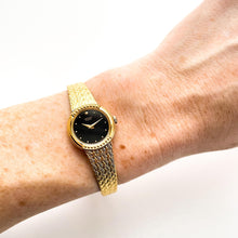 Load image into Gallery viewer, Vintage 1990s Ladies&#39; Gold-Plated Seiko Quartz Watch with Black Dial and Integrated Bracelet
