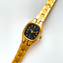 Load image into Gallery viewer, Tiny Ladies&#39; Pulsar (by Seiko) Watch with Gold-Plated Bracelet and Black Dial
