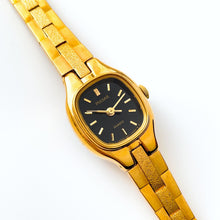 Load image into Gallery viewer, Tiny Ladies&#39; Pulsar (by Seiko) Watch with Gold-Plated Bracelet and Black Dial
