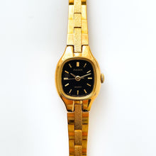 Load image into Gallery viewer, Tiny Ladies&#39; Pulsar (by Seiko) Watch with Gold-Plated Bracelet and Black Dial
