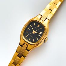 Load image into Gallery viewer, Tiny Ladies&#39; Pulsar (by Seiko) Watch with Gold-Plated Bracelet and Black Dial
