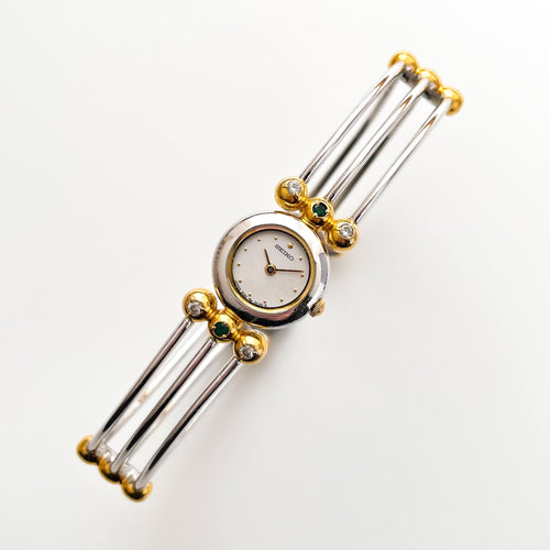 Very Rare 1990s Two-Tone Seiko Articulated Bangle Quartz Watch with Three Coloured Gemstones