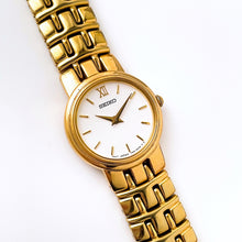 Load image into Gallery viewer, Vintage 1990s Gold-Plated Ladies&#39; Seiko Quartz Watch with Round White Dial
