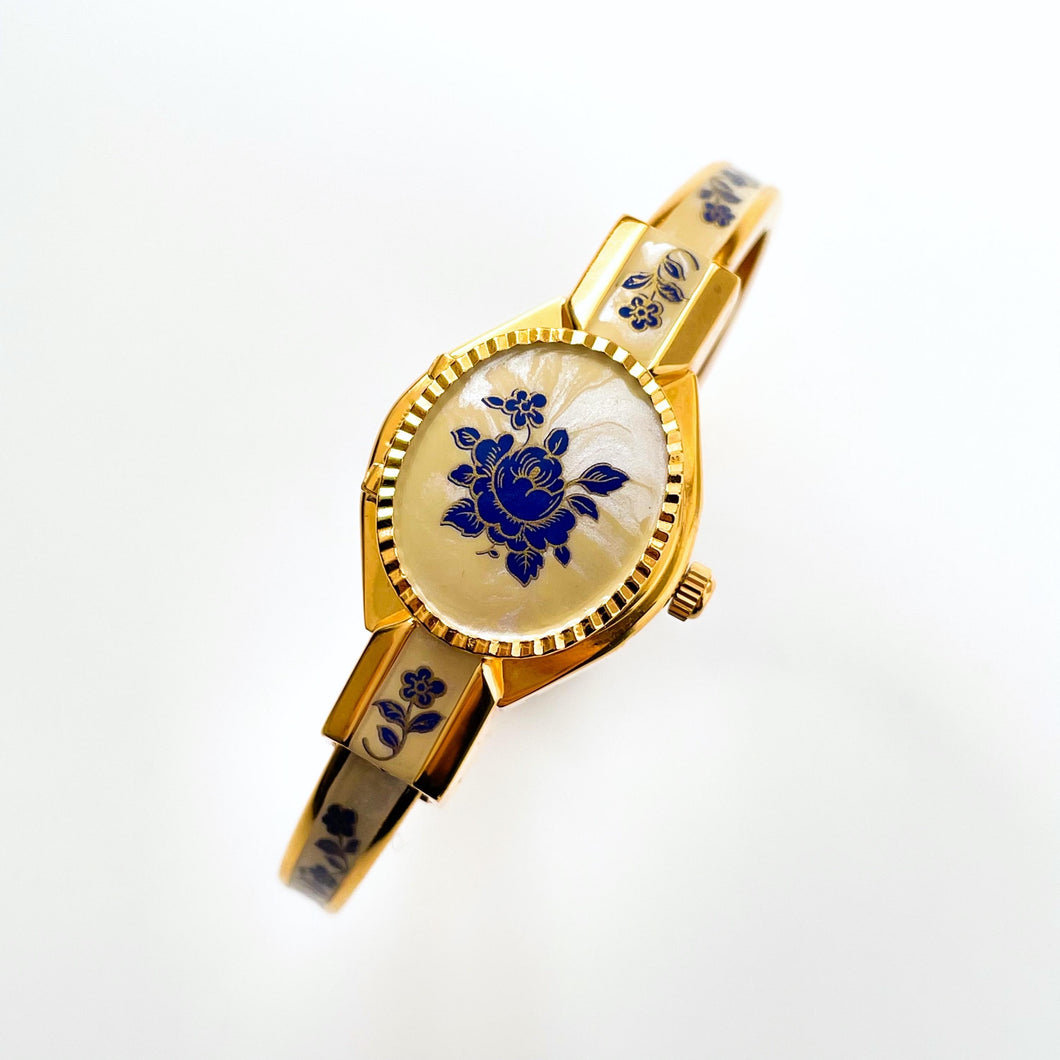 Vintage 00s André Mouche Quartz Watch with Beige and Blue Enamel Floral Design, Concealed Dial and Gold-Plated Bangle Bracelet - Boxed