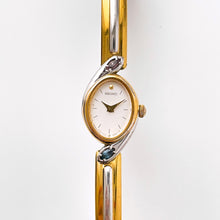 Load image into Gallery viewer, Very Rare 1990s Two-Tone Seiko Articulated Bangle Quartz Watch with White Dial and Crystal-Set Bezel
