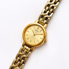 Load image into Gallery viewer, Vintage 1990s Gold-Plated Ladies&#39; Seiko Quartz Watch with Round Dial and Intricate Bracelet
