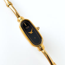 Load image into Gallery viewer, Vintage 1990s Gold-Plated Ladies&#39; Citizen Quartz Watch With Articulated Bangle Bracelet
