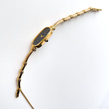 Load image into Gallery viewer, Vintage 1990s Gold-Plated Ladies&#39; Citizen Quartz Watch With Articulated Bangle Bracelet
