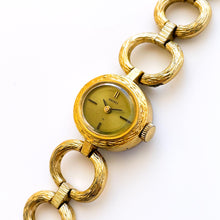 Load image into Gallery viewer, Vintage 1974 Gold-Plated Seiko Ladies&#39; Mechanical Watch with Oval Dial and Ornate Case
