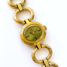 Load image into Gallery viewer, Vintage 1974 Gold-Plated Seiko Ladies&#39; Mechanical Watch with Oval Dial and Ornate Case
