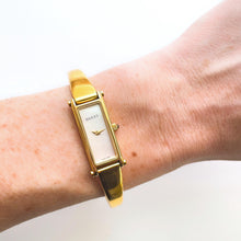 Load image into Gallery viewer, Vintage 1990s Ladies&#39; Gold-Plated Gucci 1500L Bangle Quartz Watch with Rectangular Mother of Pearl Dial
