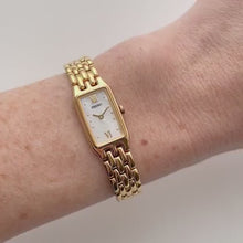 Load and play video in Gallery viewer, Thin Vintage 1990s Gold-Plated Ladies&#39; Seiko Quartz Watch with Mother of Pearl Dial
