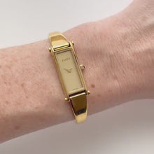 Load and play video in Gallery viewer, Vintage Ladies&#39; Gold-Plated Gucci 1500 Bangle Quartz Watch with Gold Rectangular Dial
