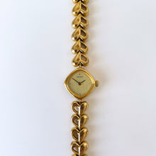 Load image into Gallery viewer, Rare 1996 Ladies&#39; Gold-Tone Seiko Quartz Watch with Heart Pattern
