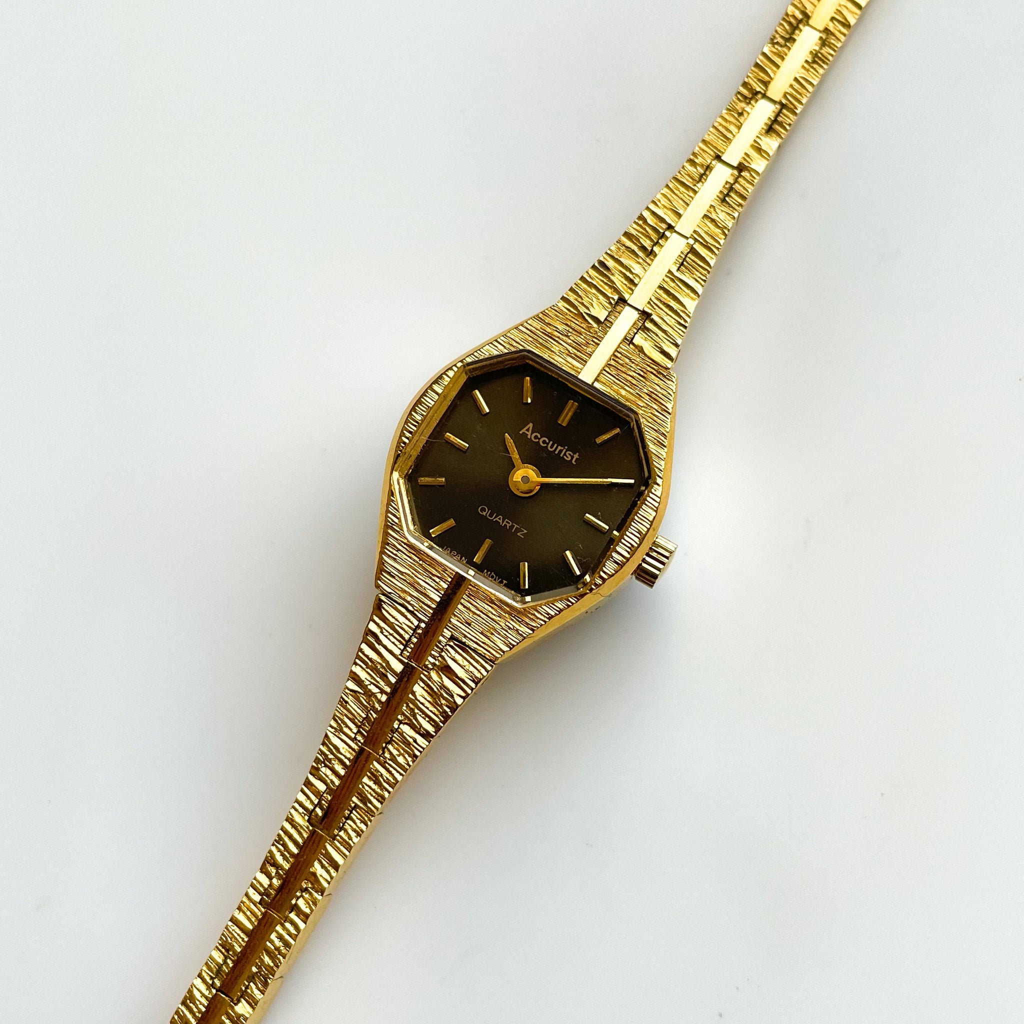 Gold Tone Accurist Ladies Quartz Watch with Black Hexagon Dial