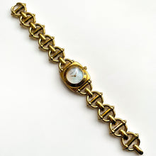 Load image into Gallery viewer, 1990s Gucci Quartz Watch with Mother of Pearl Dial and Gold-Plated Bracelet
