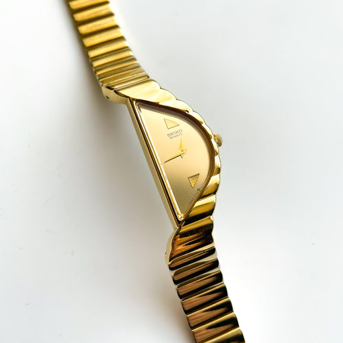 Thin Gold-Tone 1990 Ladies' Seiko Quartz Watch with Asymmetrical Dial